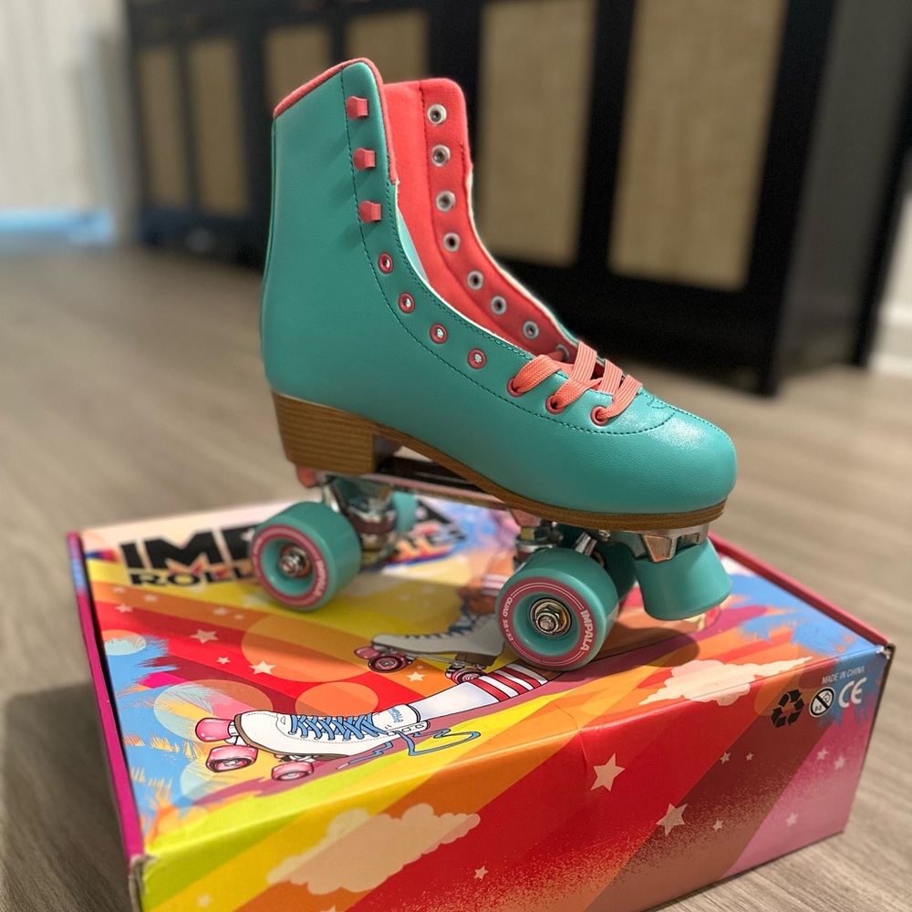 NWT Teal and Coral Impala Roller Skates 
Women’s size 8